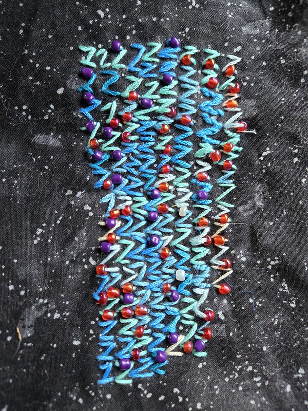 A weird wedge shape of Z's with beads