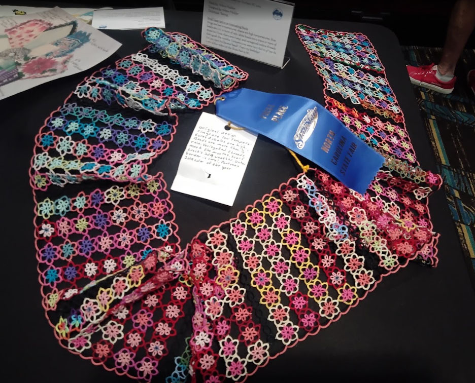 Scarf on display at 2026 IOLI conference